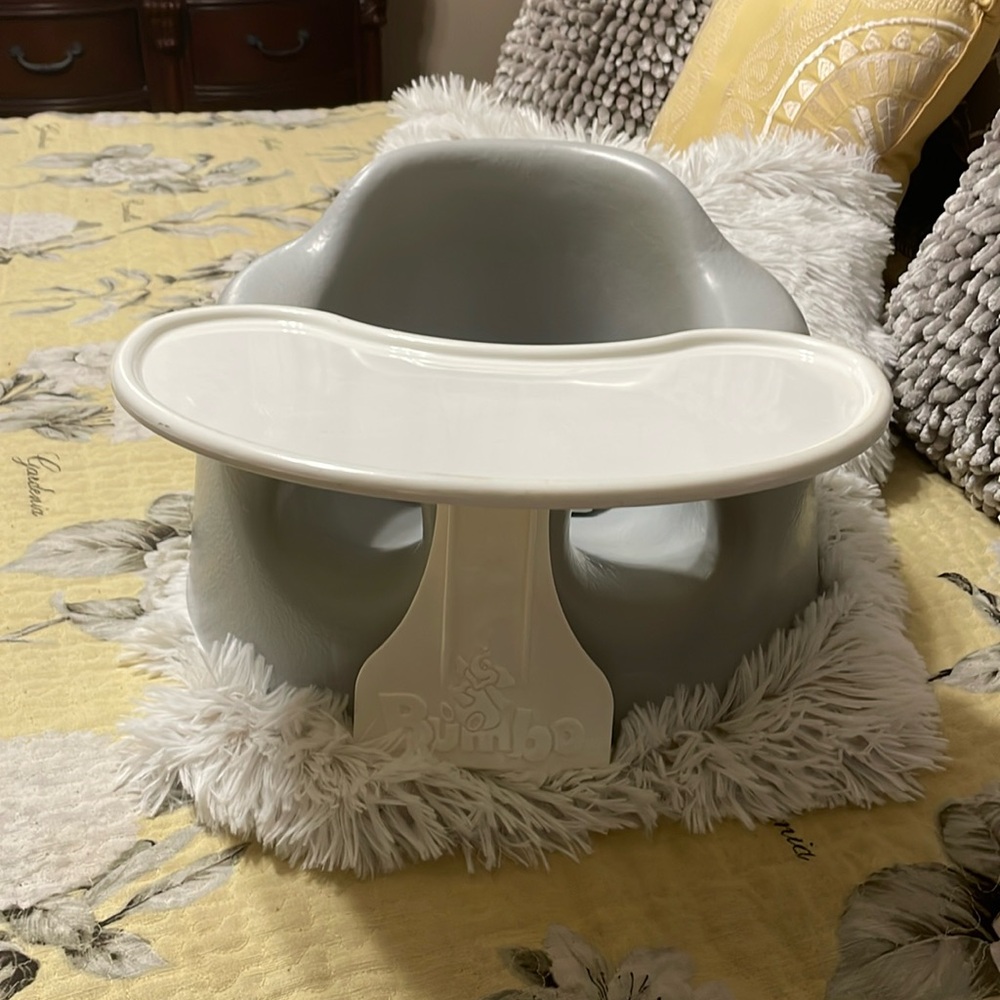 Toddlers Bumbo seat with attachable tray